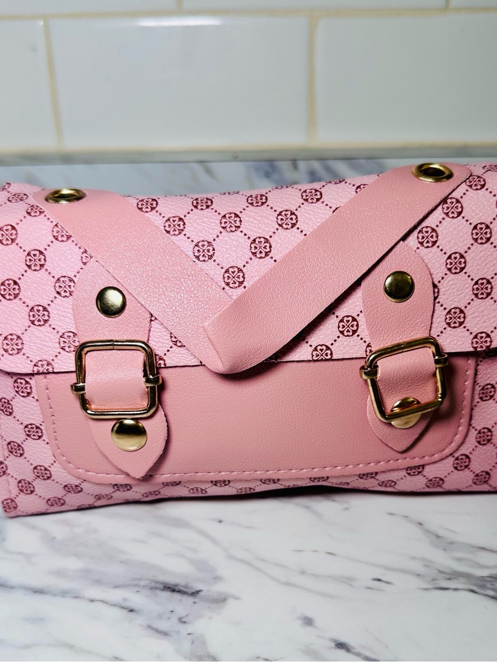 Pink Patterned Clutch with Gold-Tone Hardware